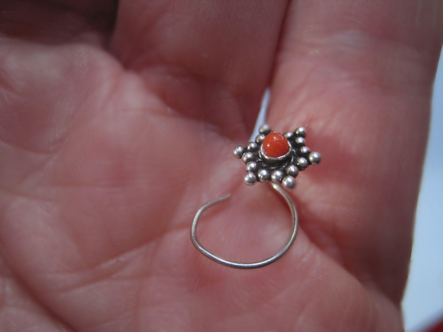 silver nose piercing