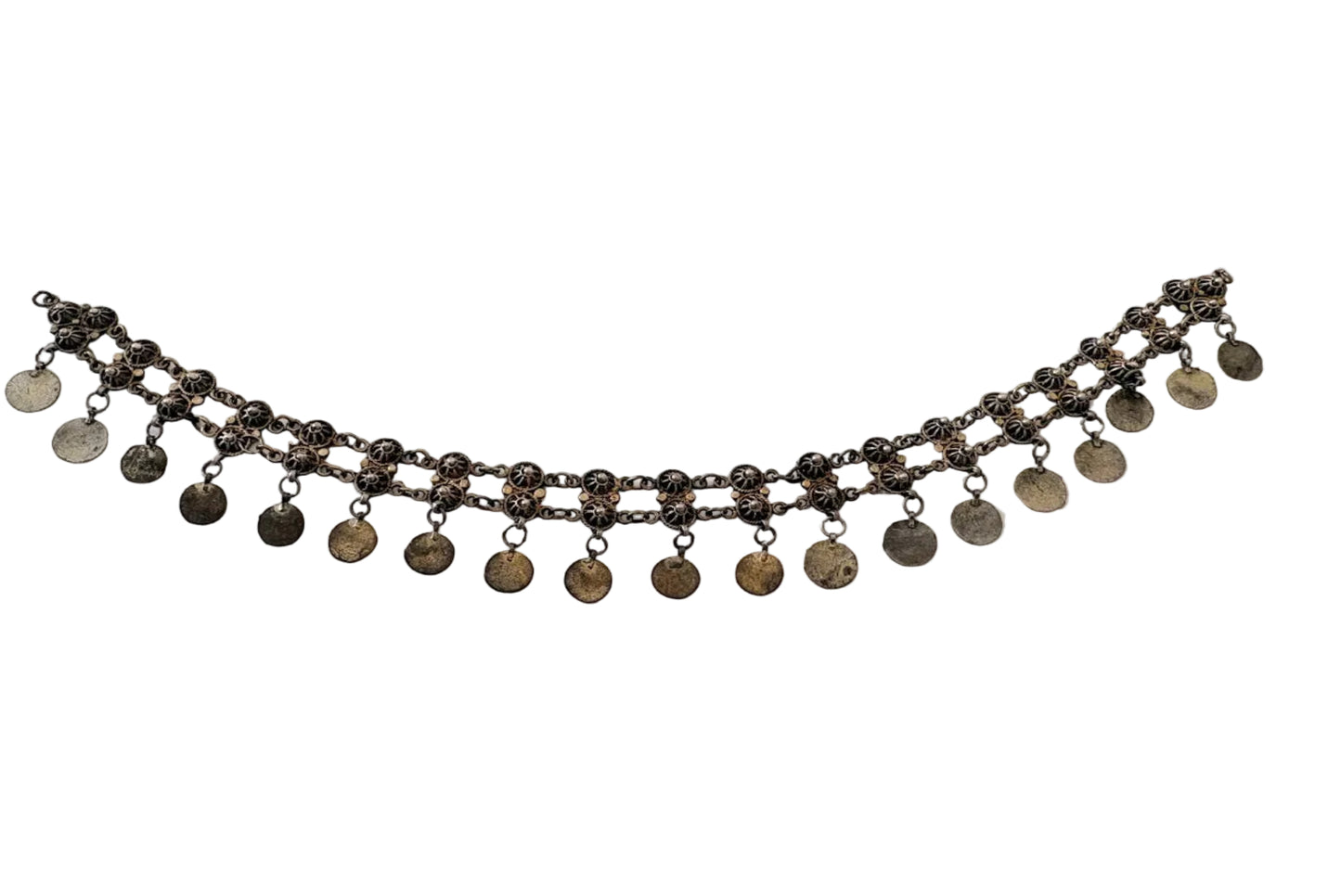 Necklace with hanging coins on a light gray background