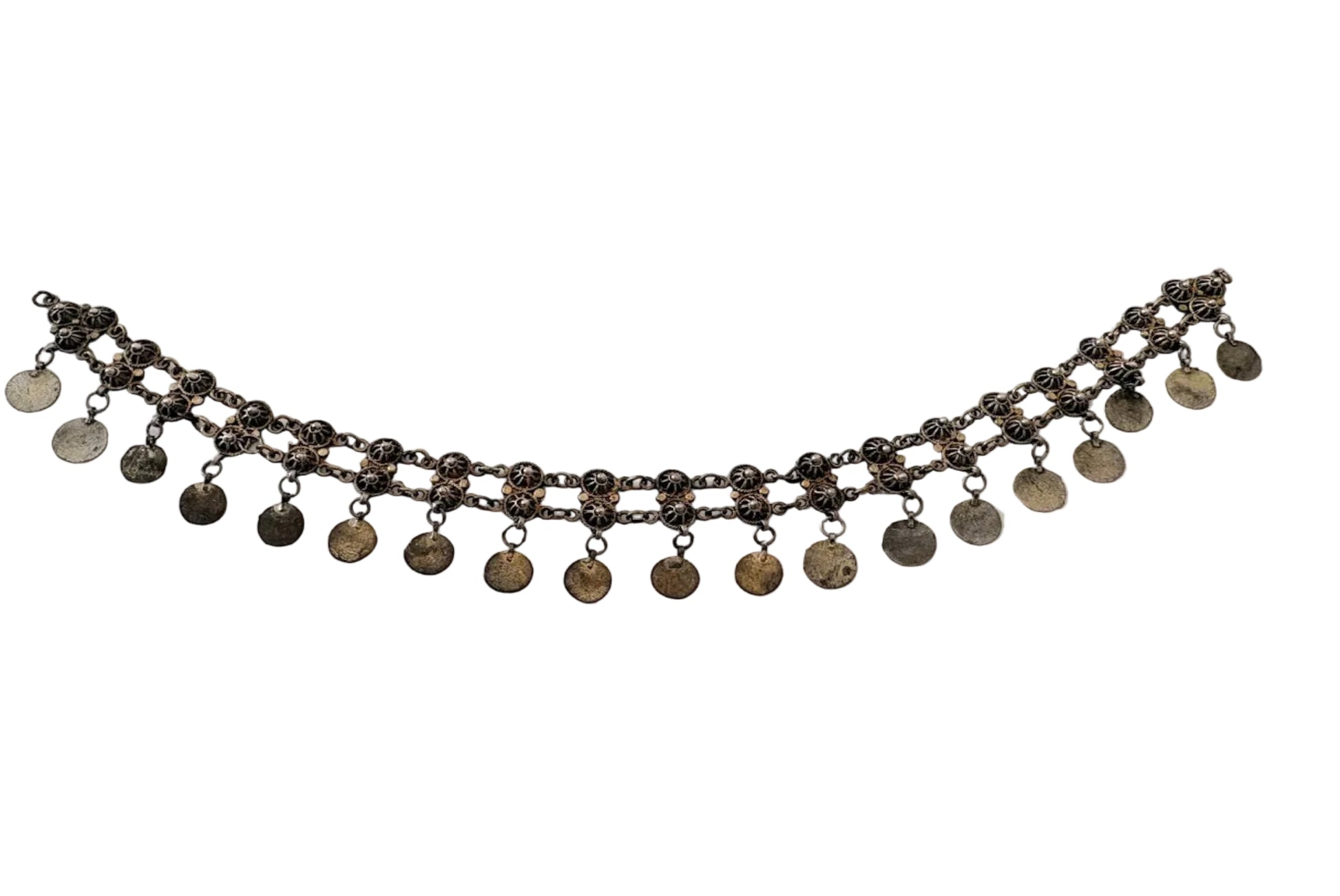 Necklace with hanging coins on a light gray background