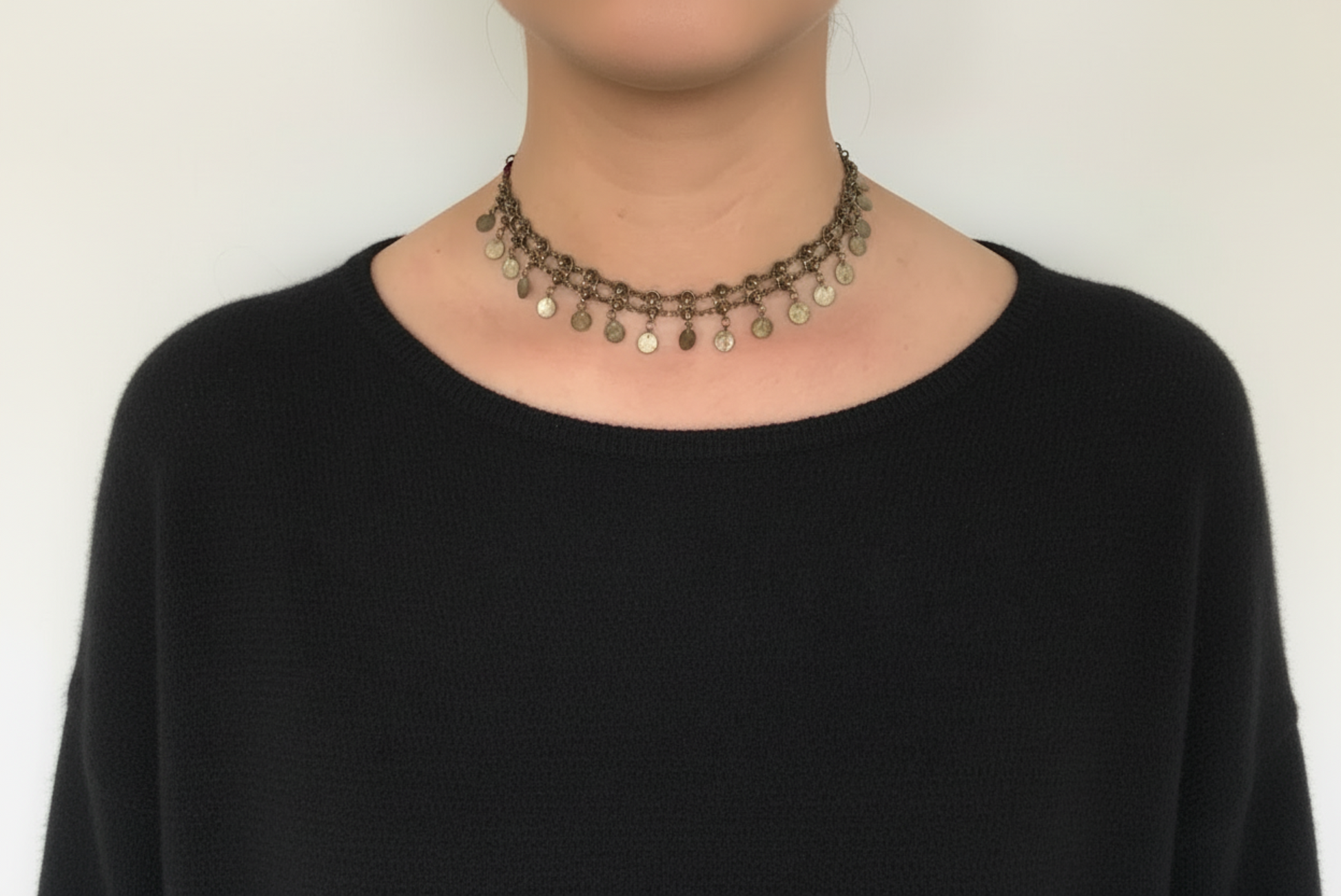 Filigree necklace worn by a model 