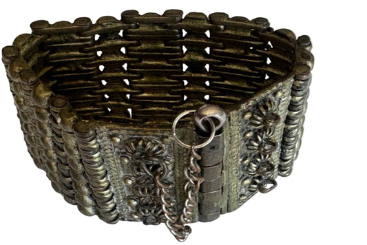 Palestinian link bracelet with intricate designs on a white background