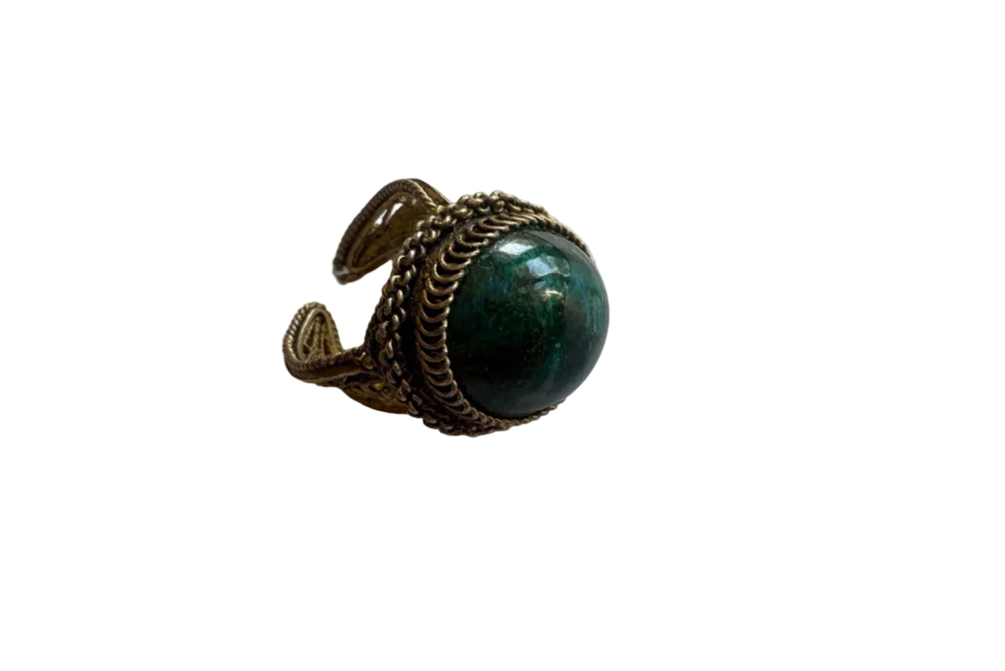 Ring with green gemstone and gold-tone band on a white background