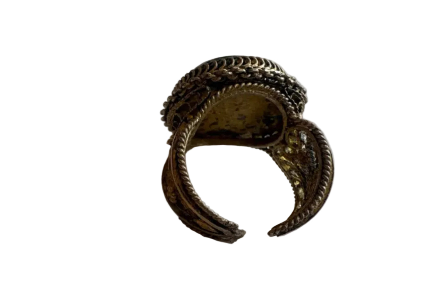 Gold gilt ring with intricate design on a white background