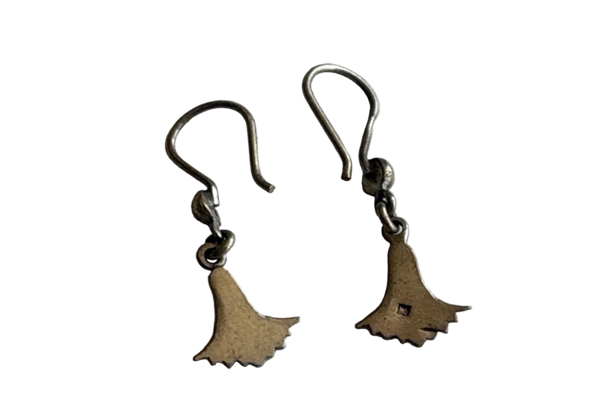 Pair of small silver earrings on a white background