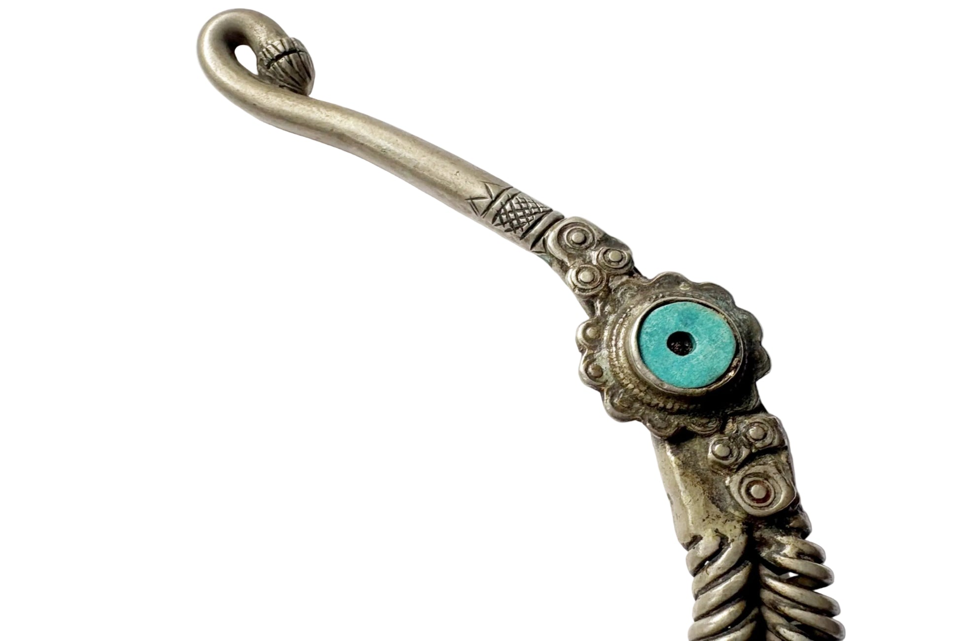 An ornate vintage finial on a torc necklace, featuring a turquoise stone inlay on a textured silver-toned metal body, shown on a plain white background.