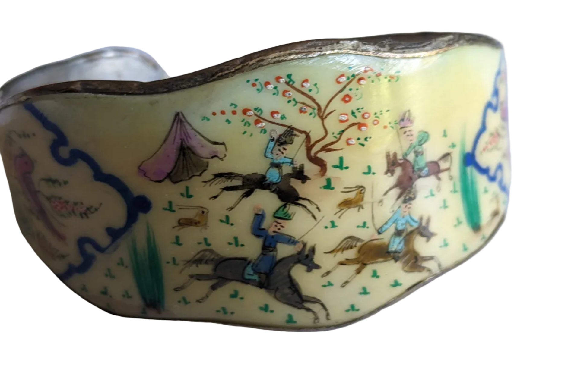 Decorative bracelet with colorful hand painted design on a white background