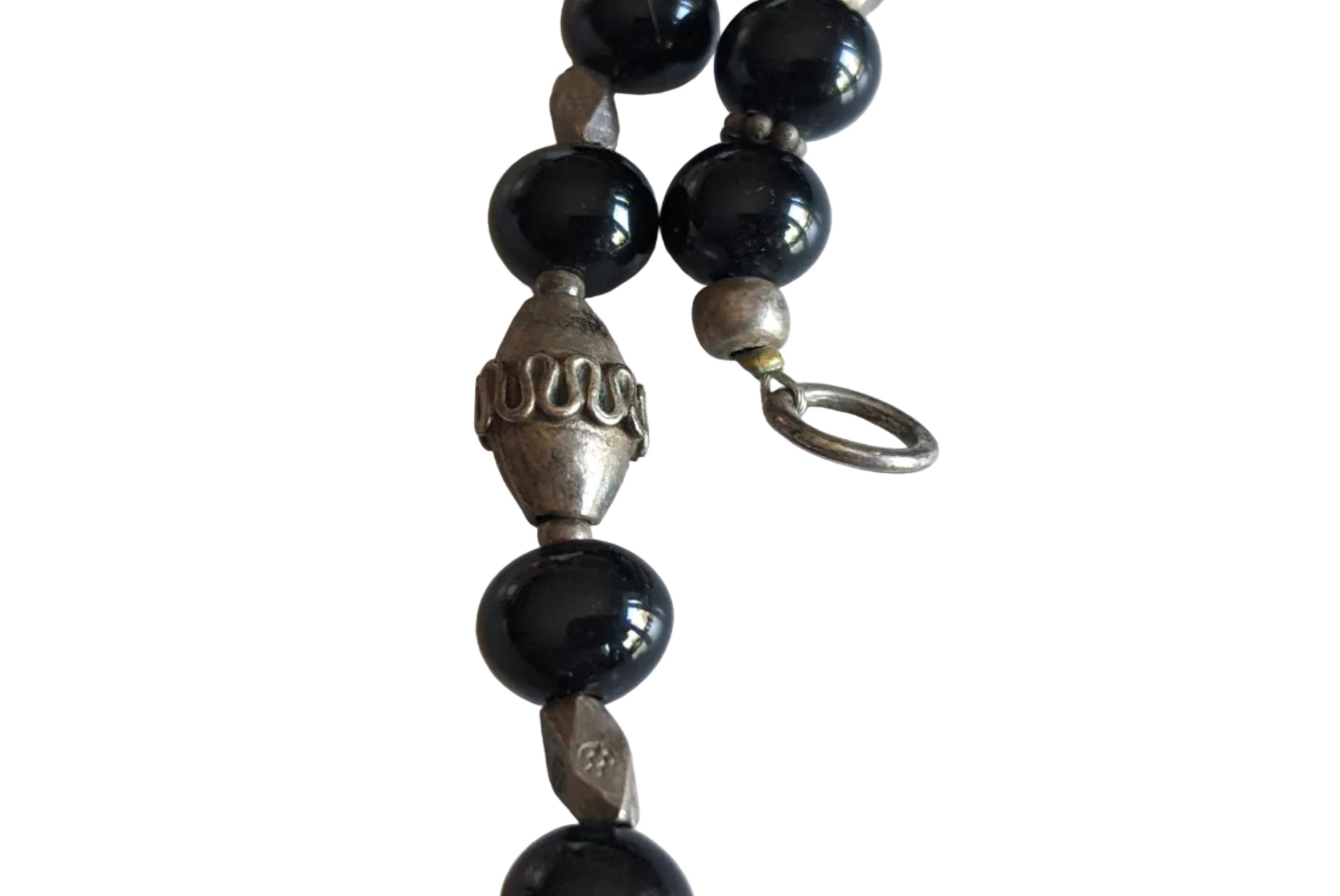 Onyx and silver beads on Egyptian  necklace on a white background