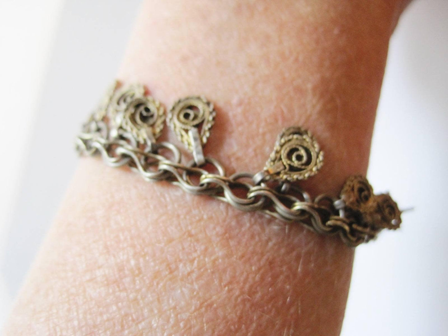 filigree chain used as a bracelet