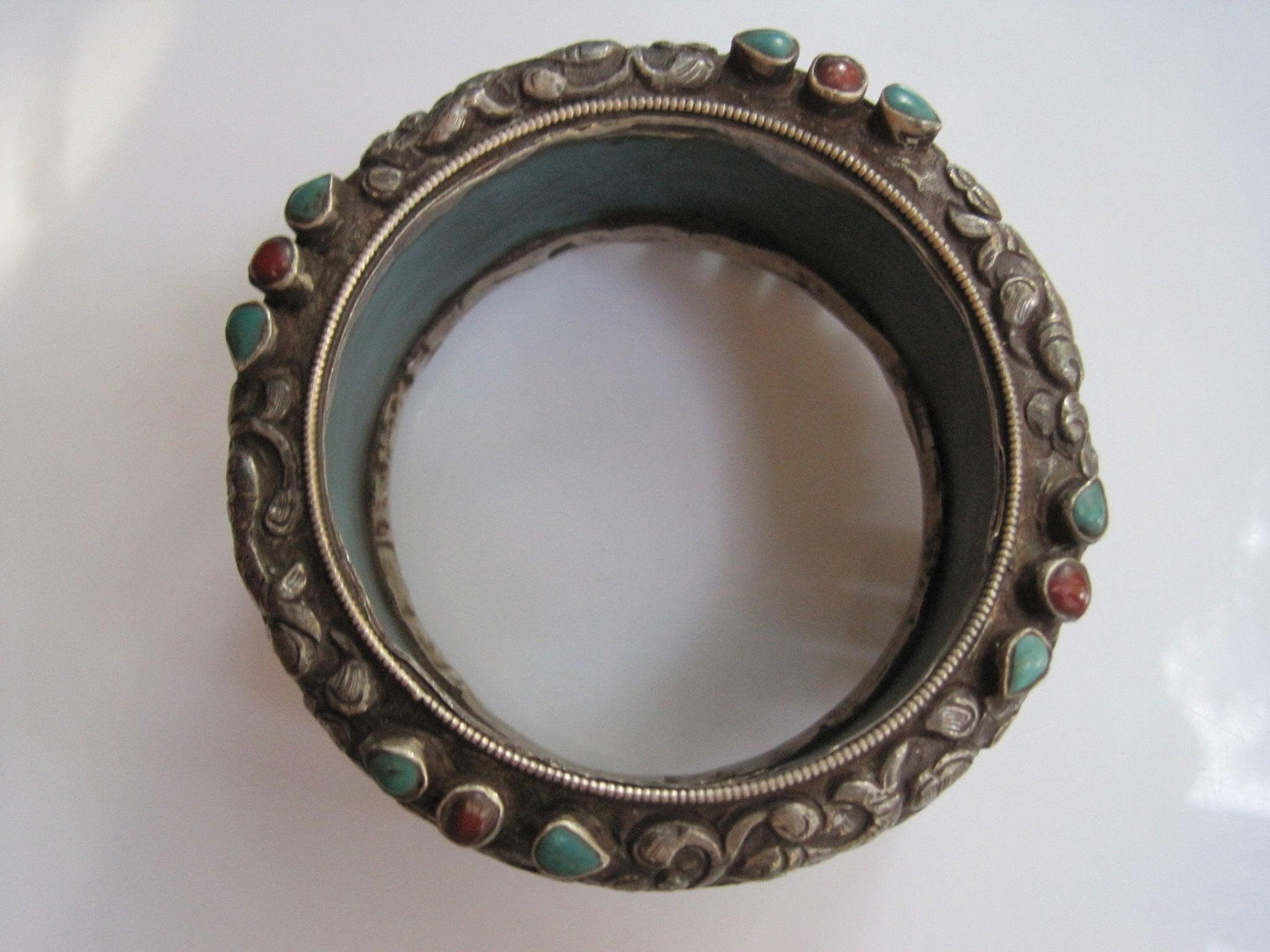 Vintage Carved Animal Blue Resin Bracelet from Nepal or Tibet with Silver Overlay - Anteeka