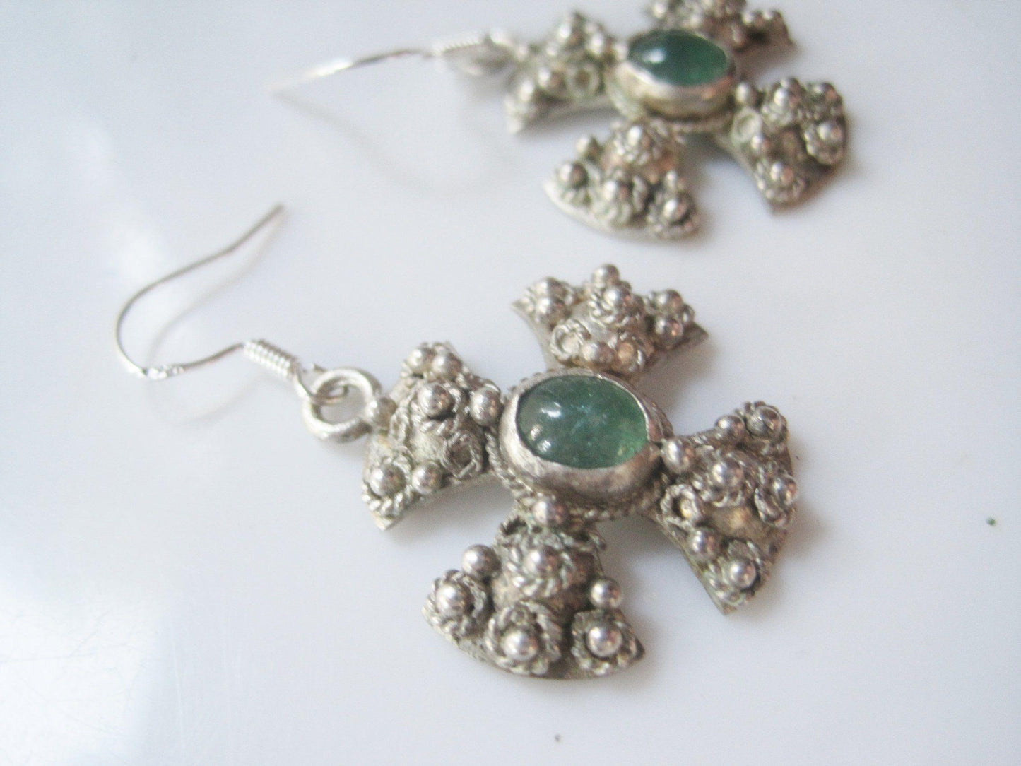 silver and green stone earrings