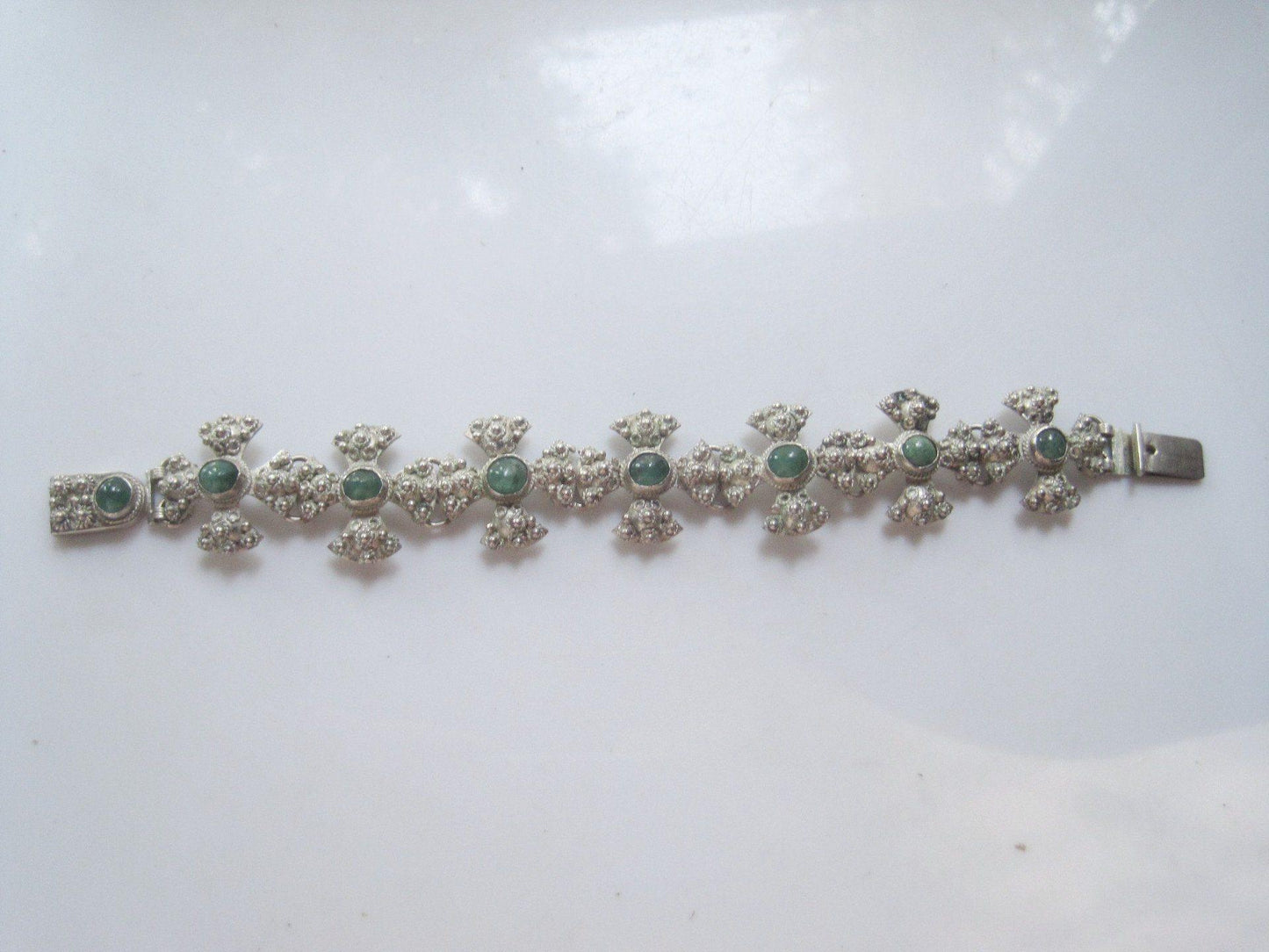 silver and green stone bracelet