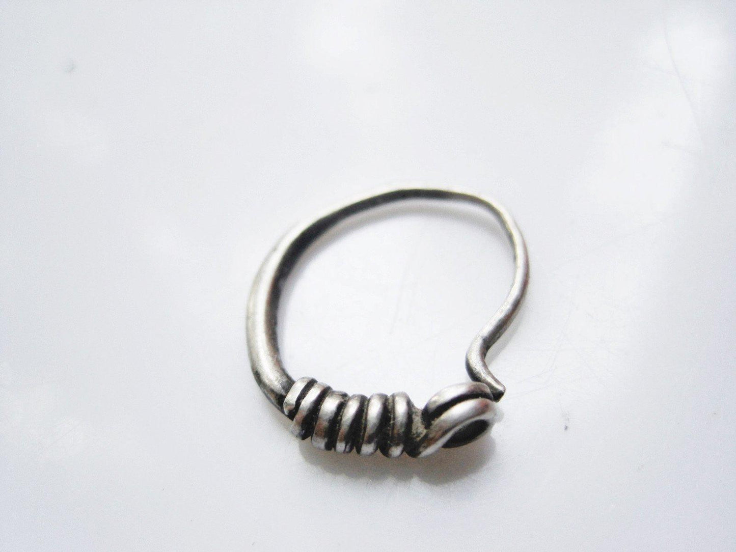 silver hoop nose ring