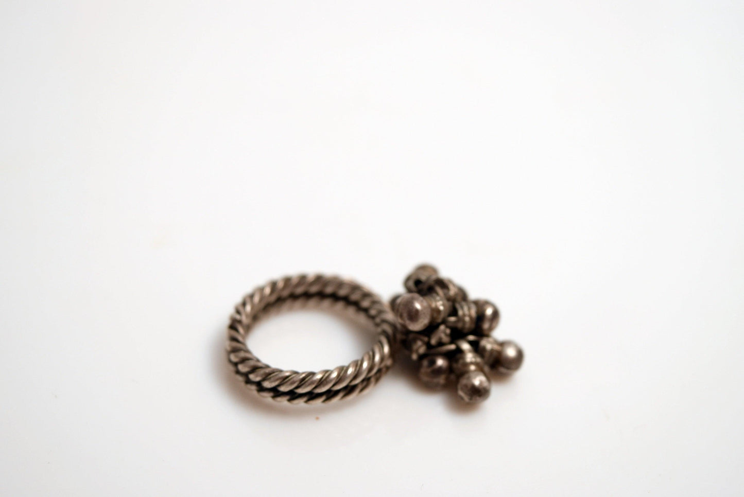 silver ring with dangles