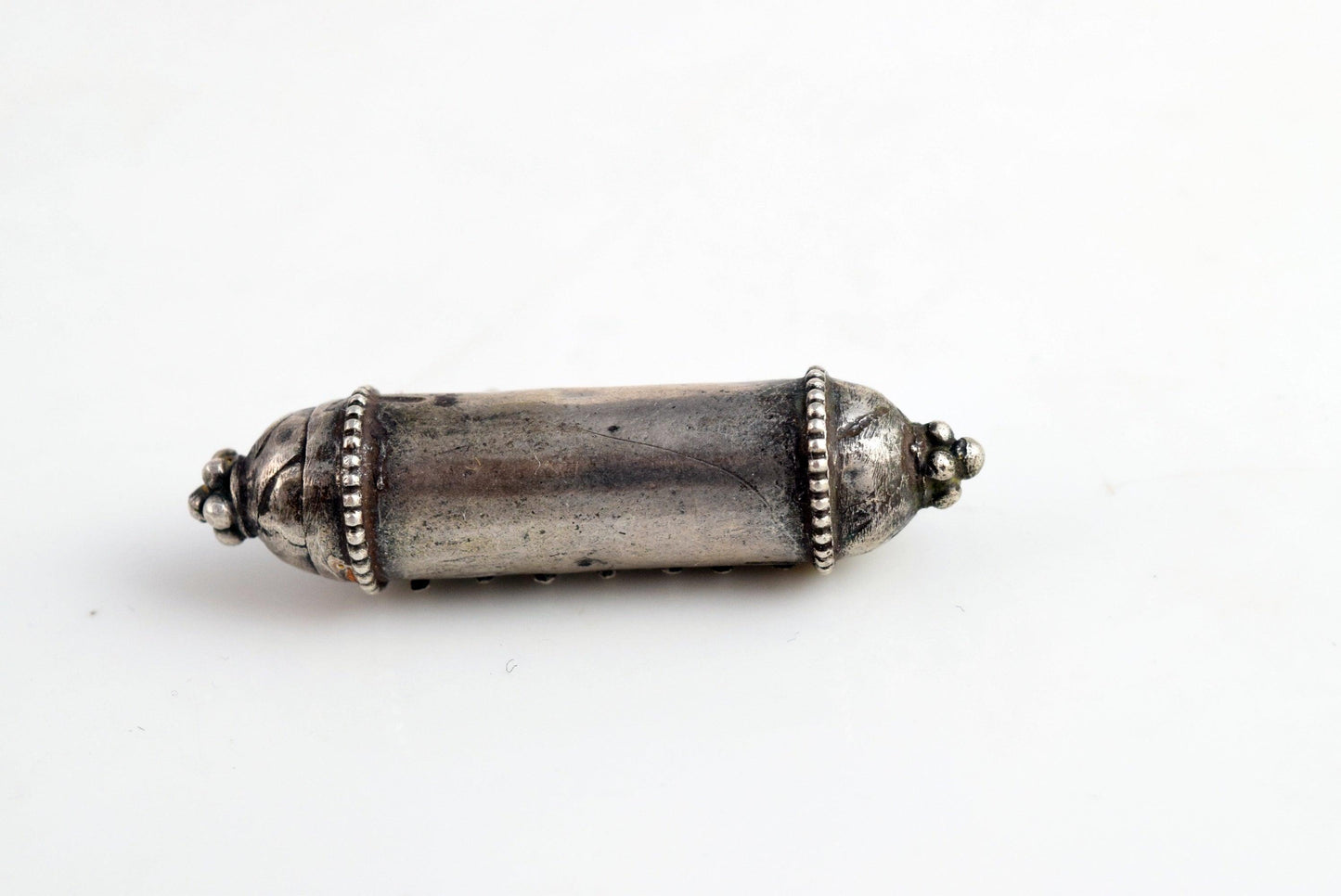 silver indian amulet