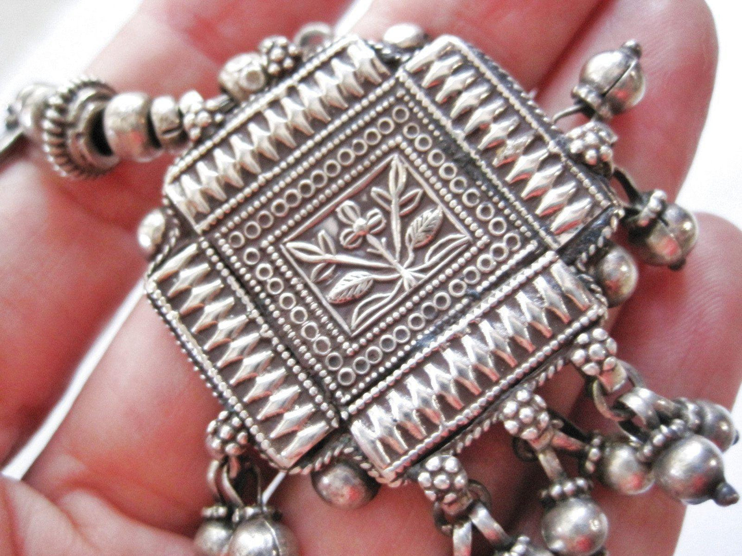silver amulet